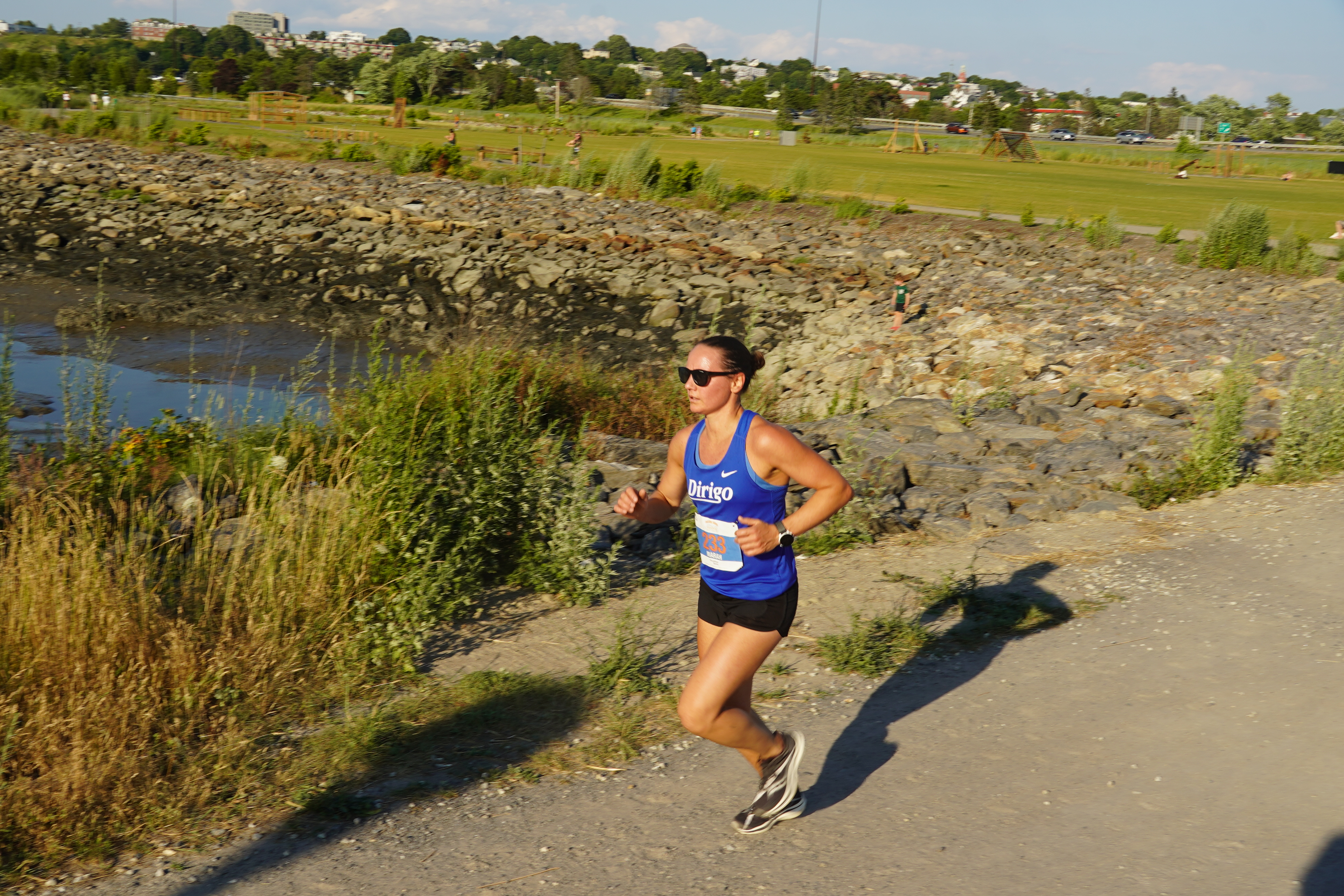 Dirigo runners racing at the Weekly Back Cove 5K.