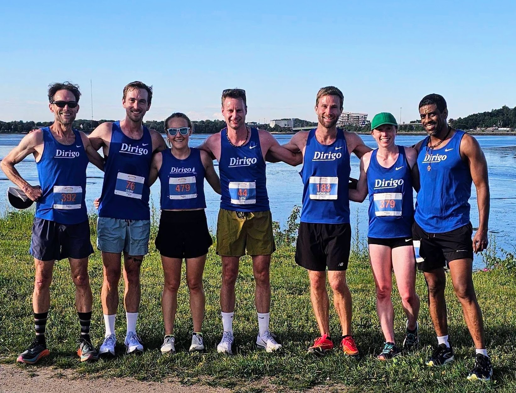 Dirigo runners in blue singlets at Back Cove in 2026.