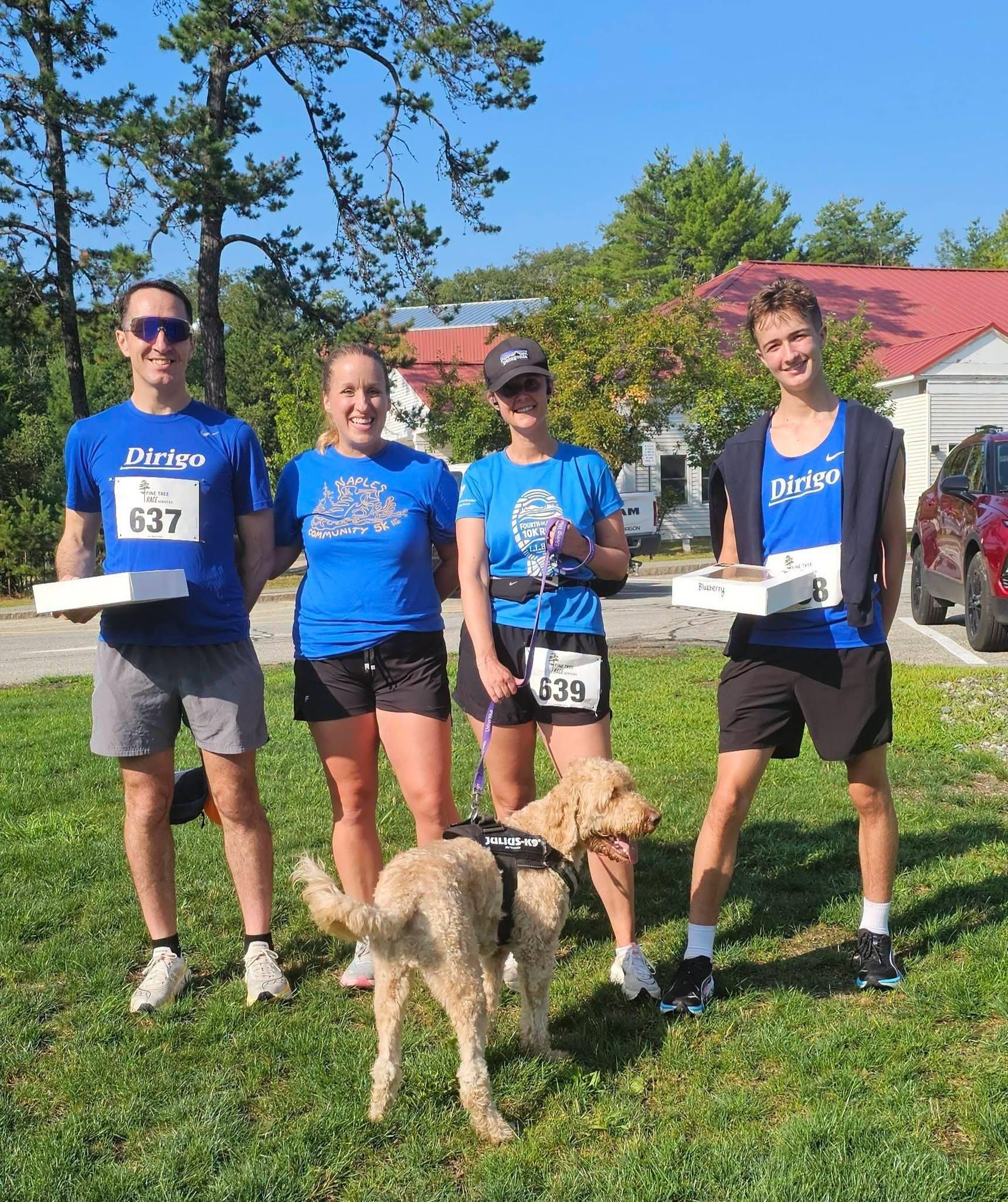 Dan and Levi Bannon with fellow participants after the Naples Community 5K.
