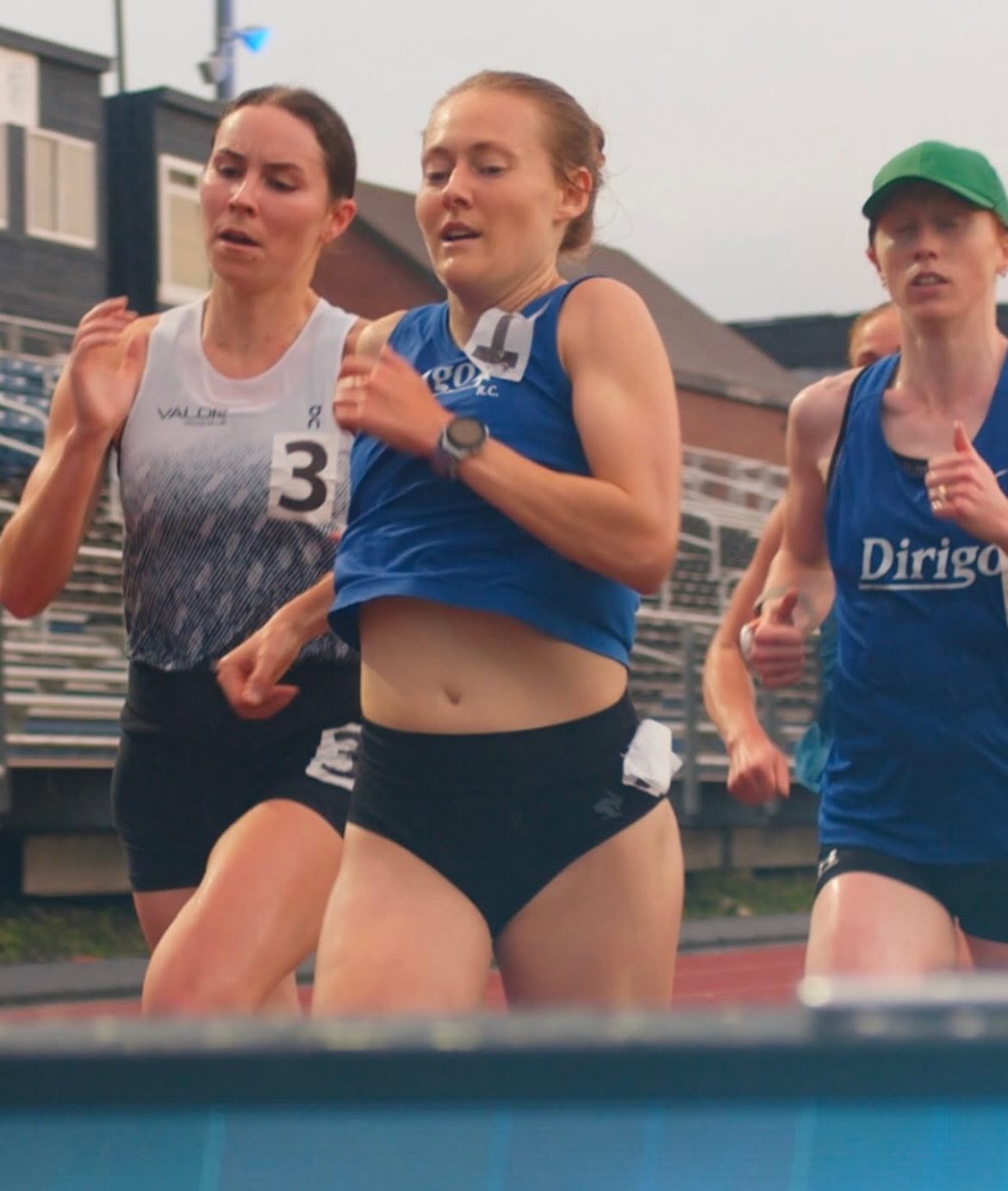 Dirigo runners racing the women's 5000 meters at the Valor Twilight Series.